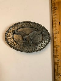 Image 1 of 1985 Pewter Eagle floral belt buckle 