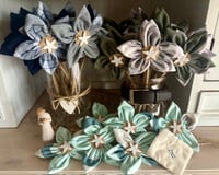 Image 1 of Memory Flowers custom created from a clients loved ones stunning clothing collection