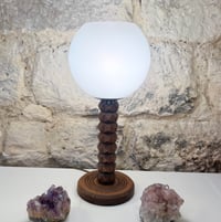 Image 2 of Lampe brutaliste en bois de Charles Dudouyt 1940 pied facettes globe opaline blanche