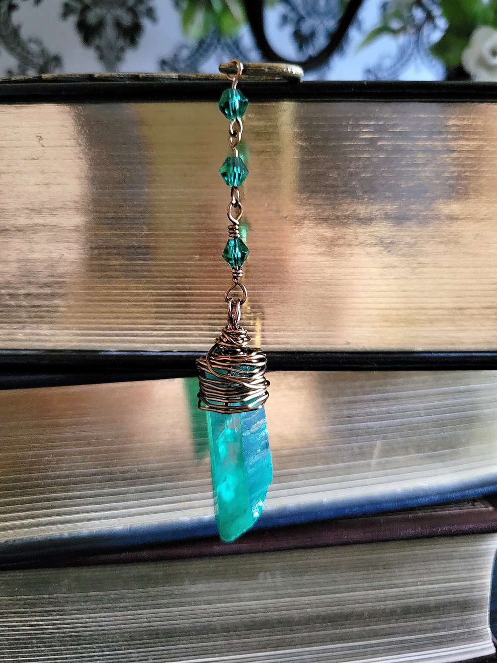 Image of Metal Feather Bookmark with Green Quartz Point