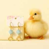 GOLD ROUND DANGLE WITH LIGHT COLORED BLUE BEAD