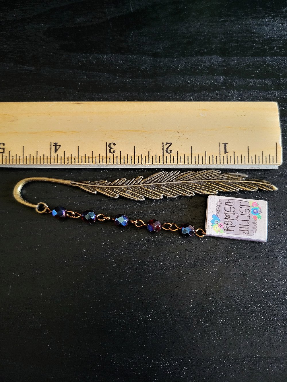 Image of Romeo and Juliet Metal Feather Bookmark