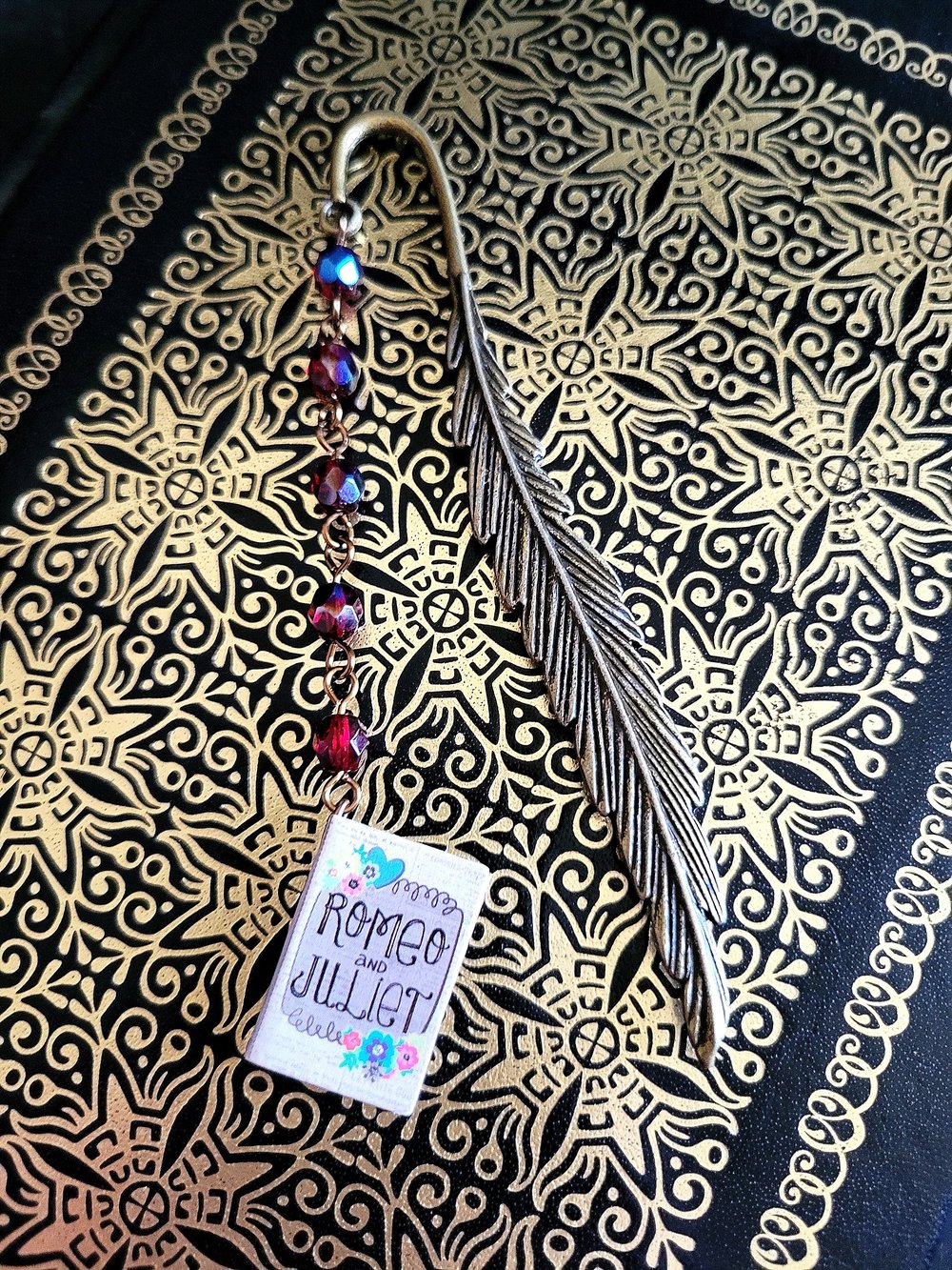 Image of Romeo and Juliet Metal Feather Bookmark