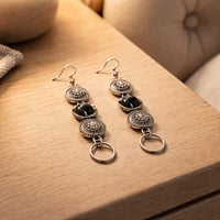 SILVER AND BLACK OPEN RING WITH SILVER DANGLE