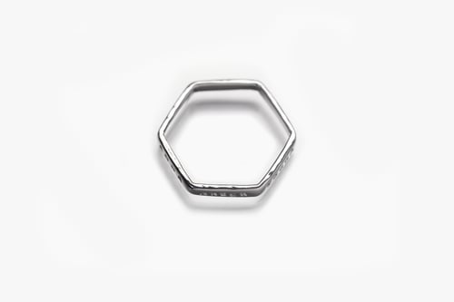 Image of Silver light hexagon ring with inscription in Latin