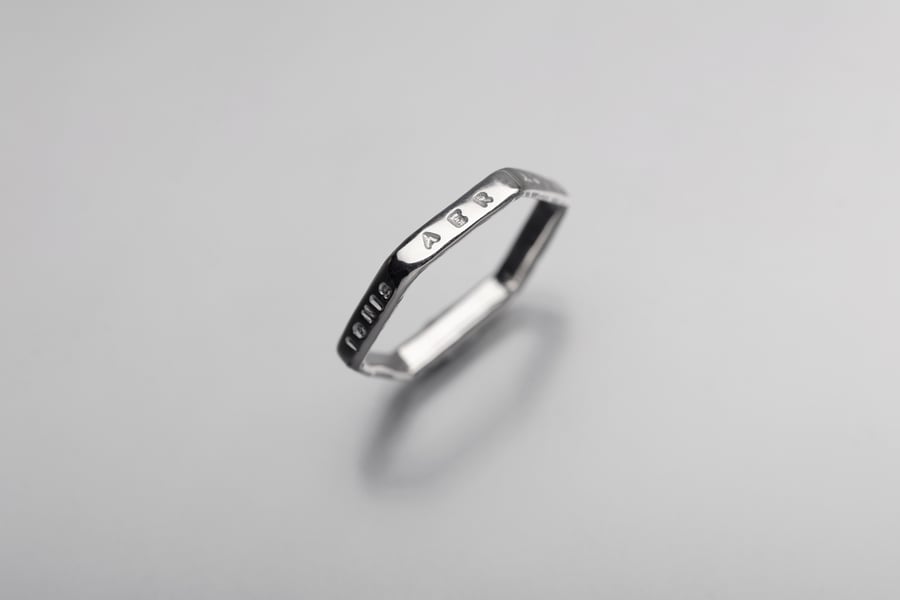 Image of Silver light hexagon ring with inscription in Latin