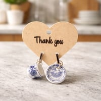 TEA CUP AND SAUCER EARRINGS.png