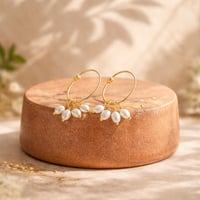 GOLD HOOP WITH IVORY COLORED HEART DANGLES