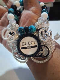 Image 2 of Gucc in black out
