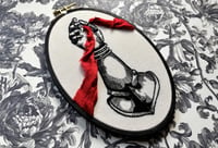 Image 1 of Gauntlet with Red Ribbon Embroidery Hoop 8x5½"