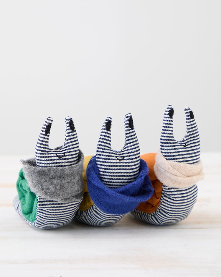 Image of Copy of Small Handmade Green Linen Snail Wearing A Grey Woollen Scarf