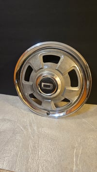Image 1 of 240z Series 1 "D" Hubcap - original - SINGLE