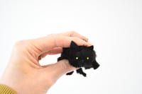 Image 1 of black kitten