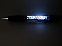 Image 1 of Skateboard lighted ink pen