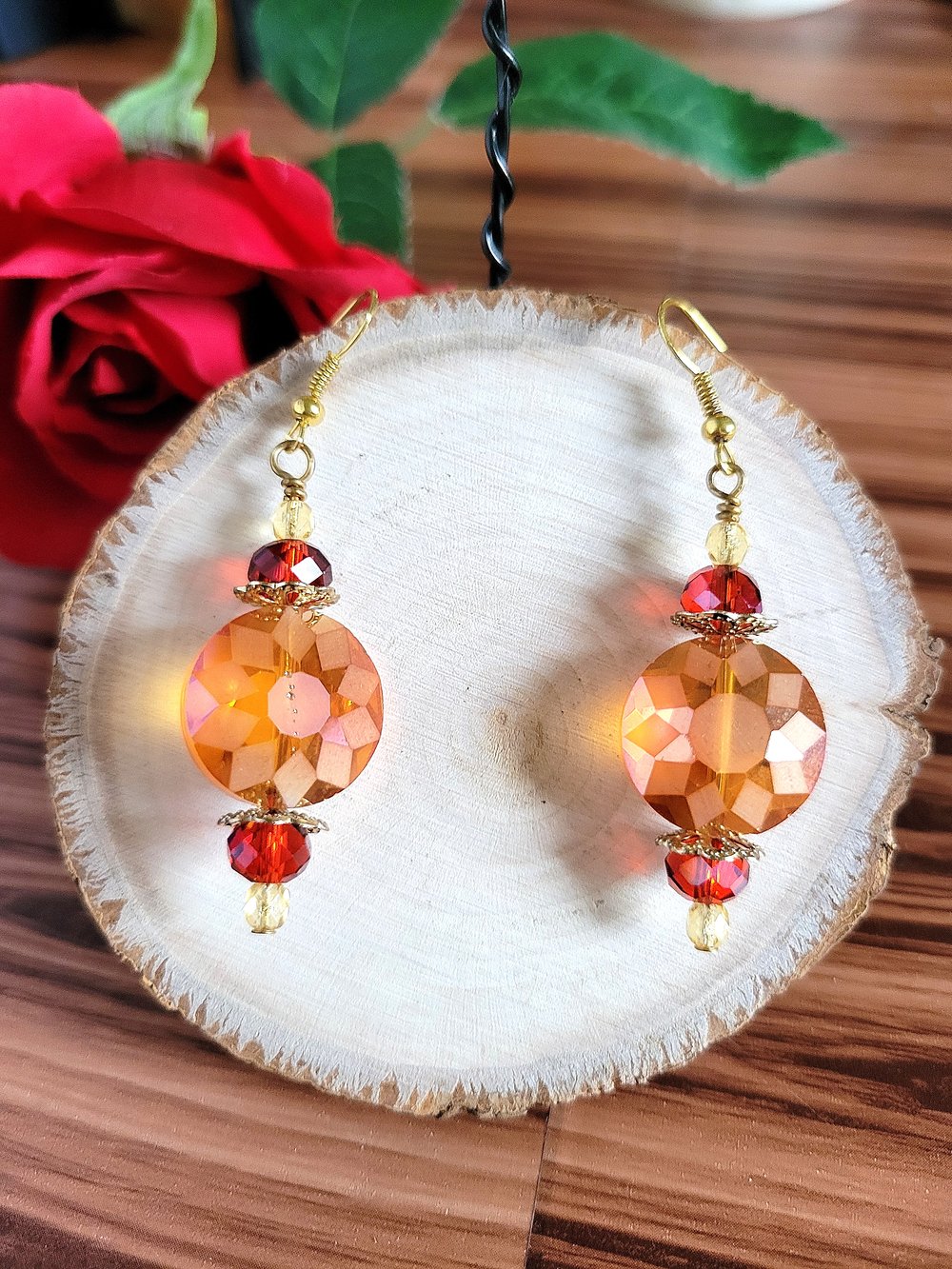 Image of ​Orange Disc Earrings with a Sunburst Pattern