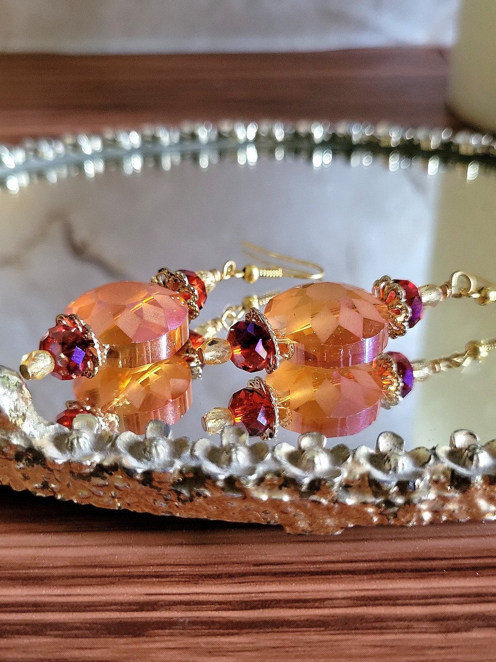 Image of ​Orange Disc Earrings with a Sunburst Pattern