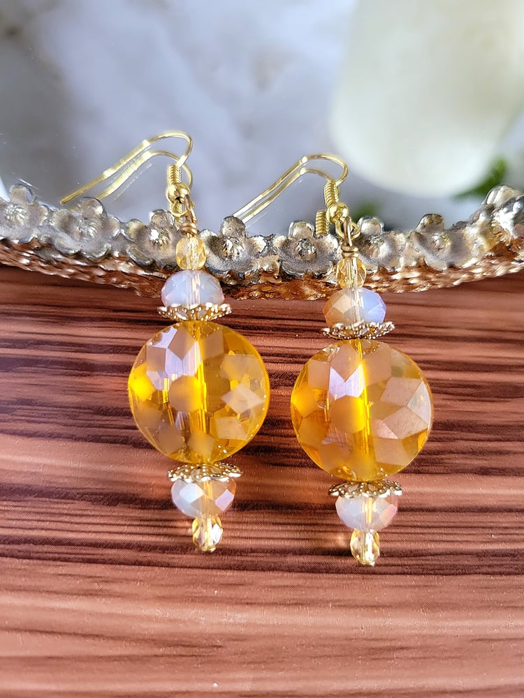 Image of Yellow Disc Earrings with a Sunburst Pattern