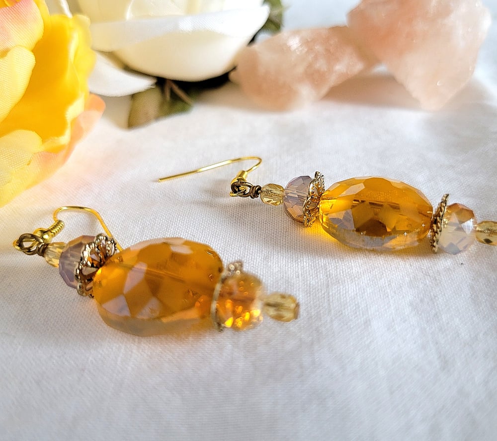 Image of Yellow Disc Earrings with a Sunburst Pattern