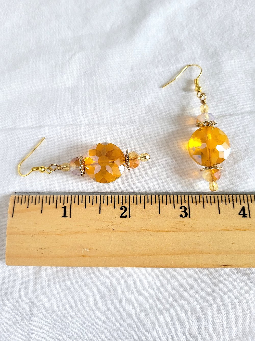 Image of Yellow Disc Earrings with a Sunburst Pattern