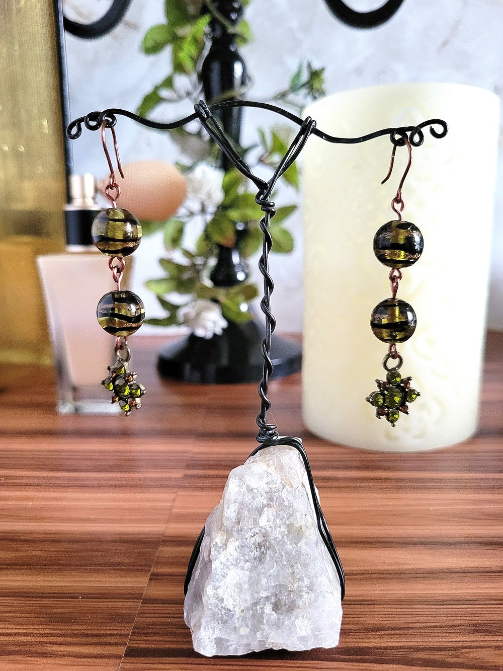 Image of Black Swirl Beaded Earrings with Peridot Flower Charm