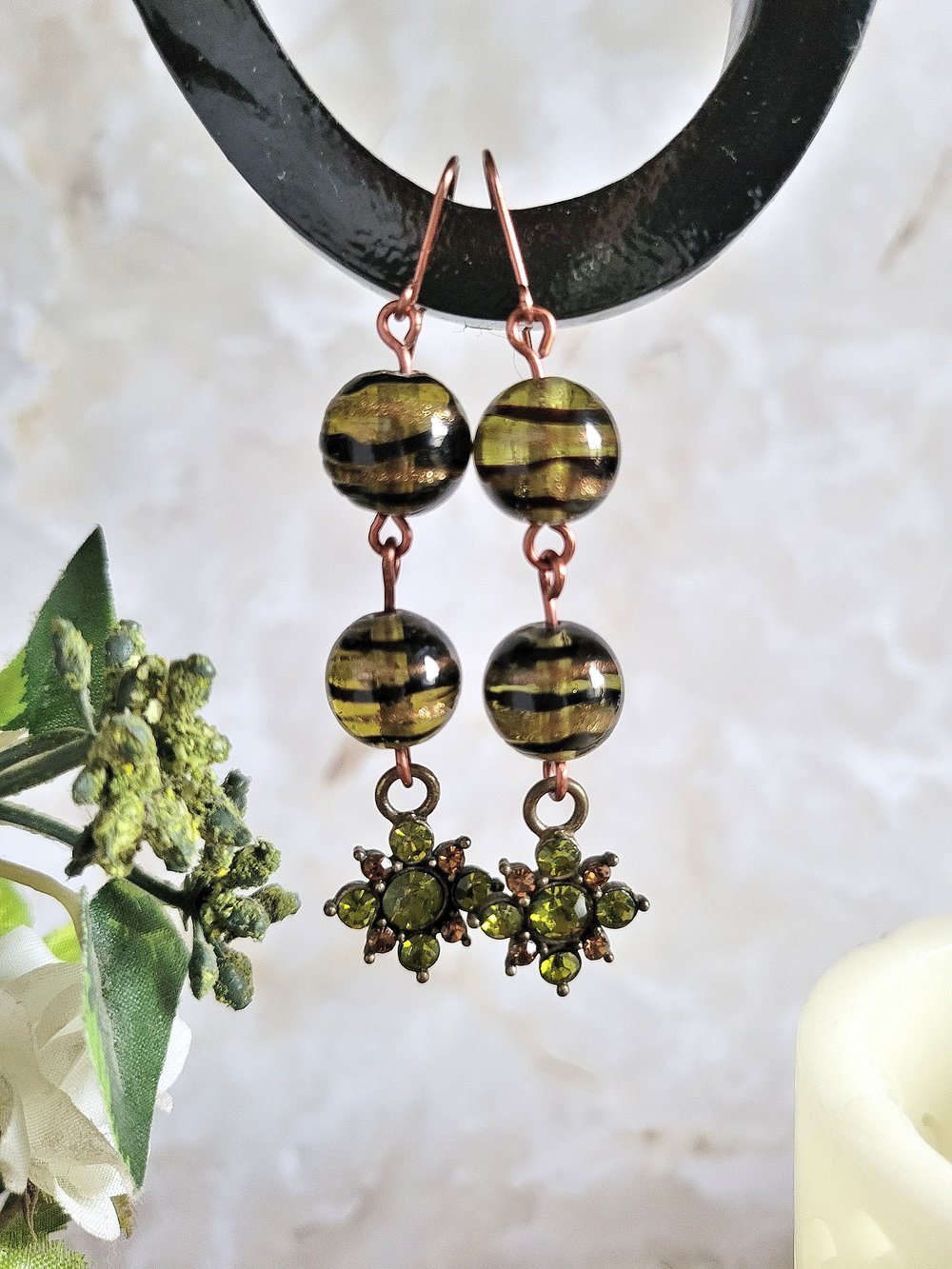 Image of Black Swirl Beaded Earrings with Peridot Flower Charm