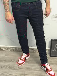 Image 1 of Jeans uomo effetto stellato