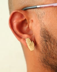 Image 1 of Studs | Manos 2