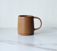 Image 1 of 16 oz mug in Rust