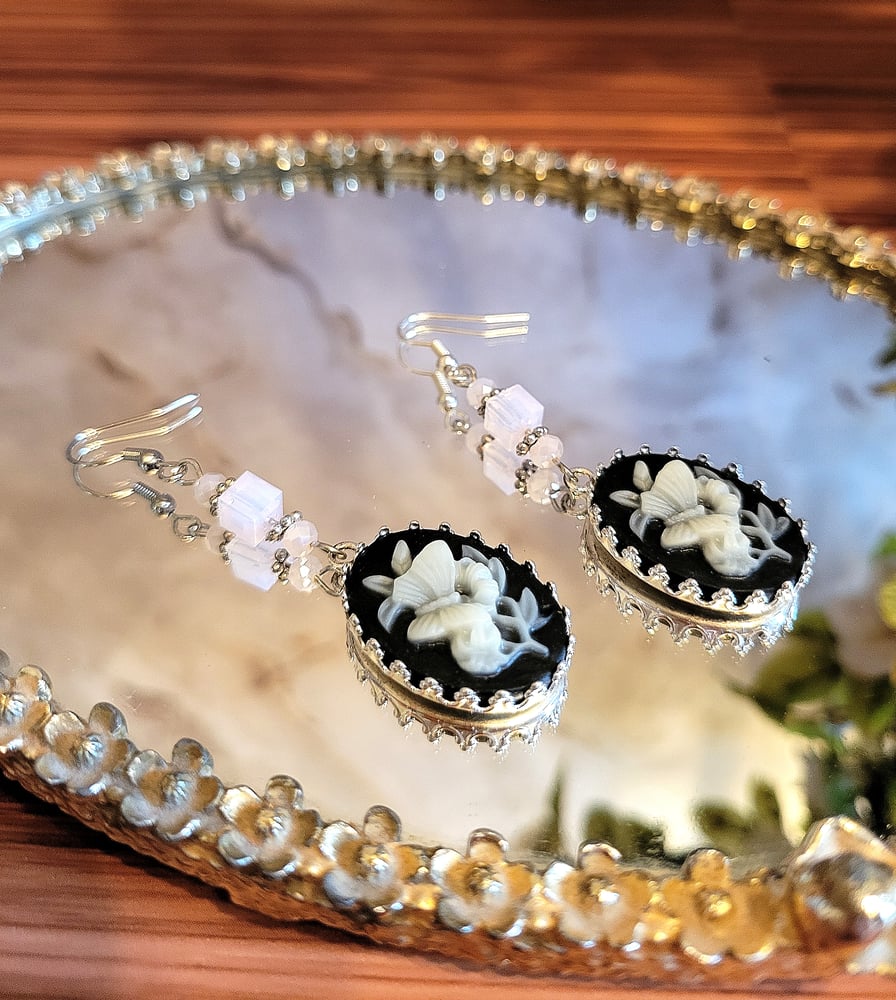 Image of Black and White Butterfly Cameo Dangle Earrings with Pink Accents