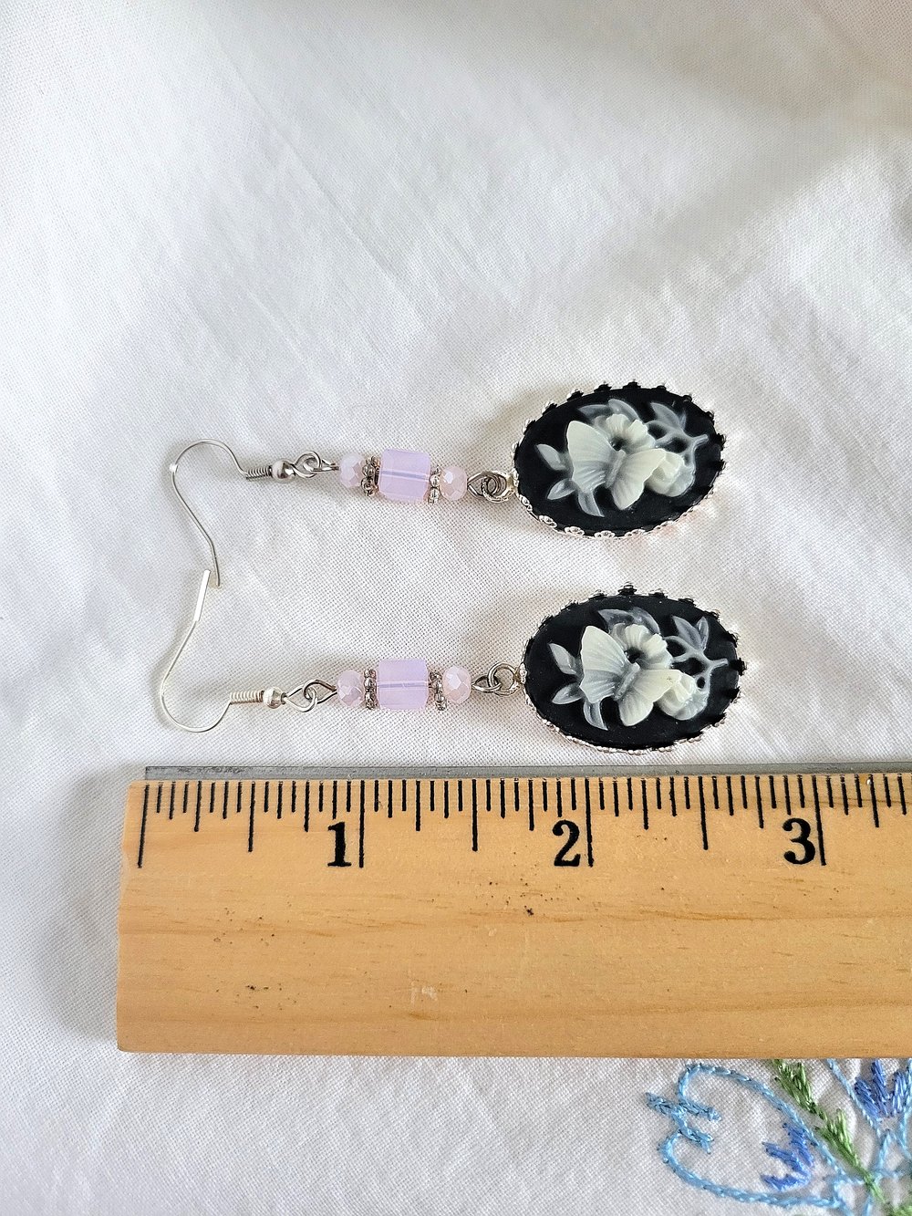Image of Black and White Butterfly Cameo Dangle Earrings with Pink Accents