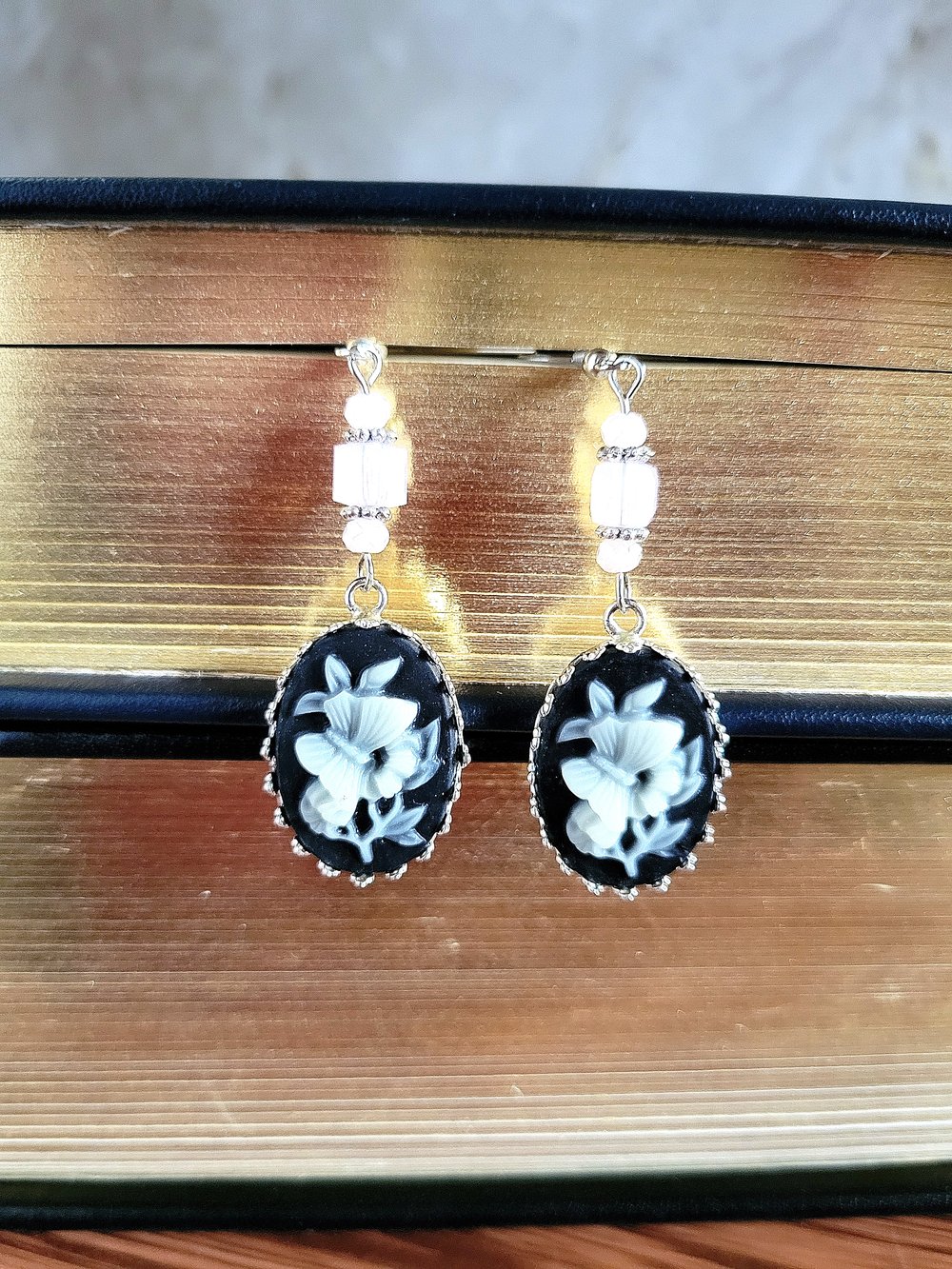 Image of Black and White Butterfly Cameo Dangle Earrings with Pink Accents