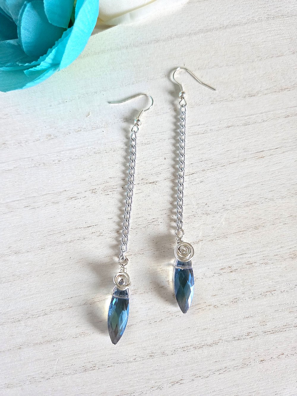 Image of Blue Diamond Dagger Earrings with Wire Rose Detail