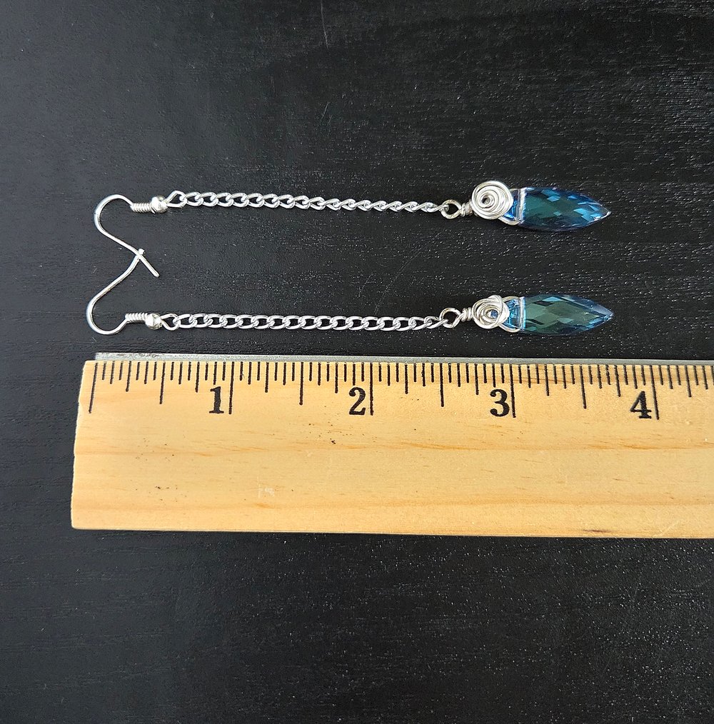 Image of Blue Diamond Dagger Earrings with Wire Rose Detail
