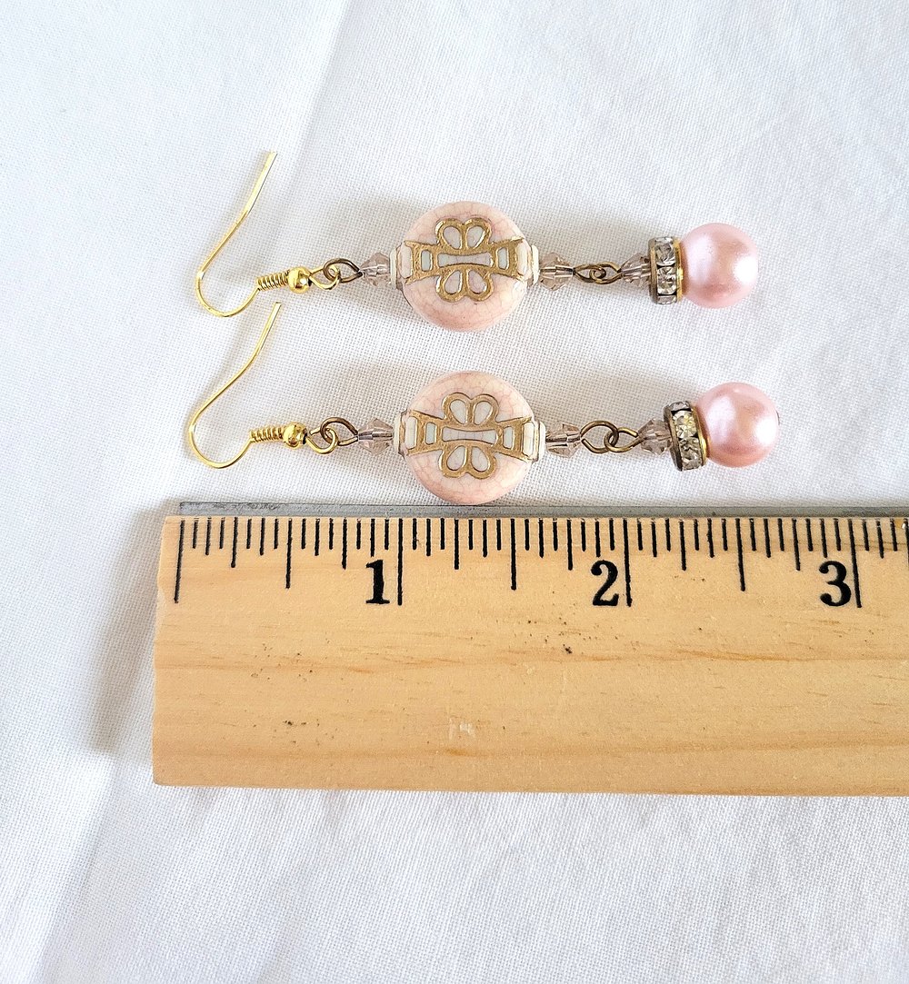 Image of Pink Beaded Dangle Earrings with Gold Butterfly Design