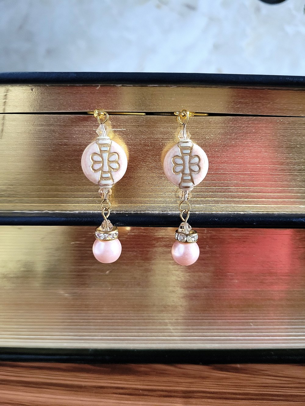 Image of Pink Beaded Dangle Earrings with Gold Butterfly Design