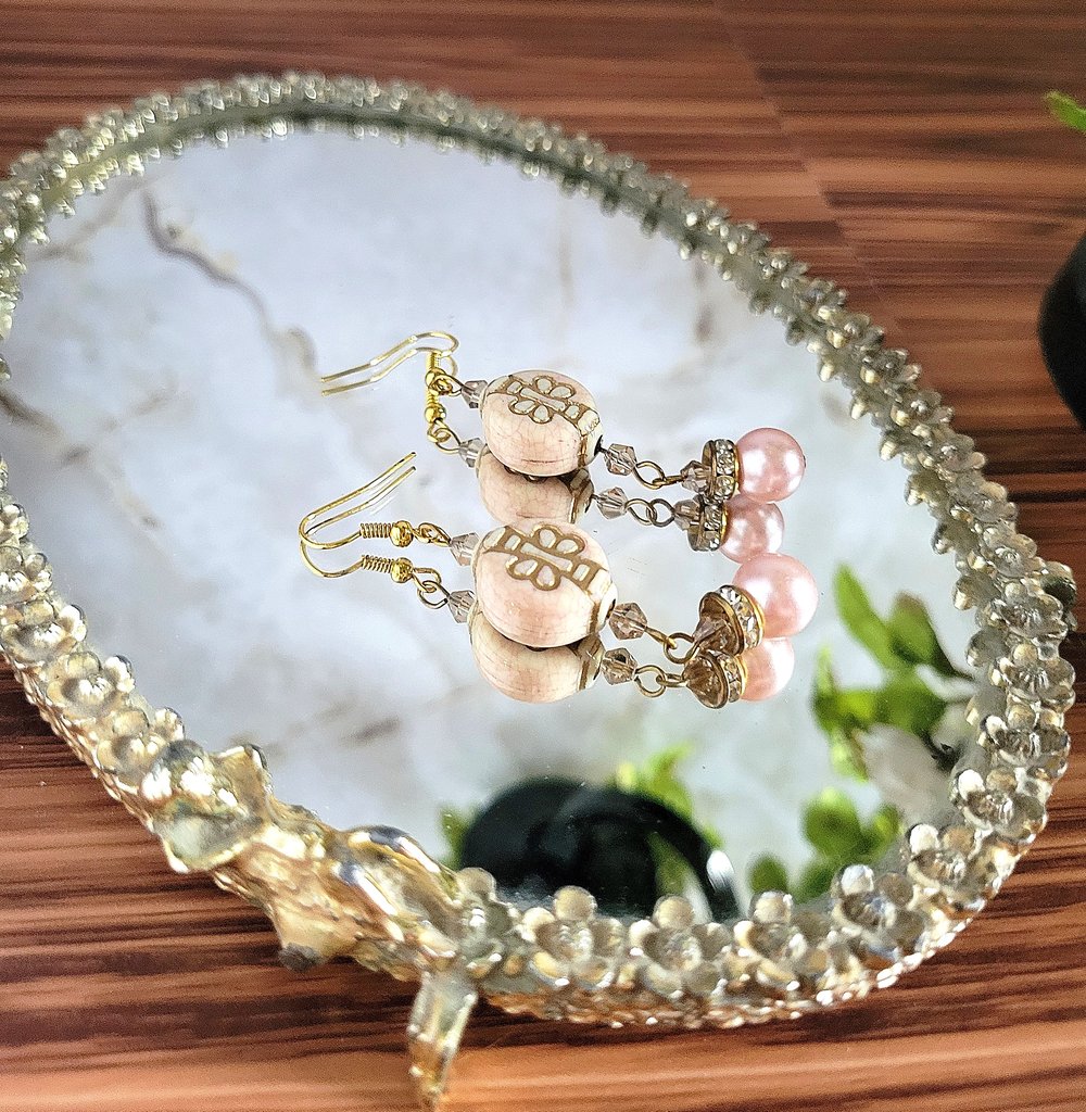 Image of Pink Beaded Dangle Earrings with Gold Butterfly Design