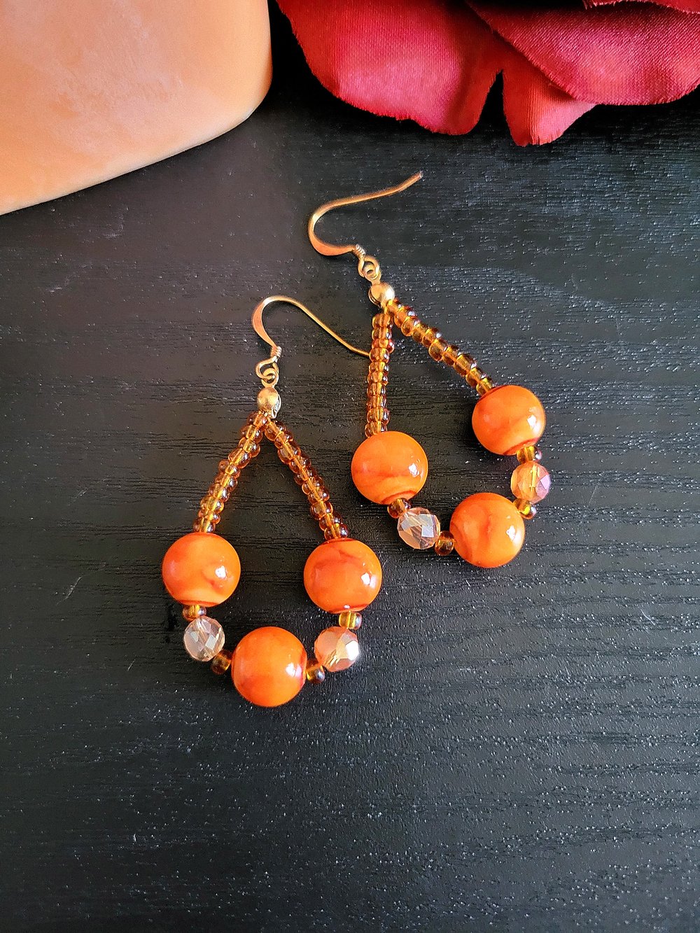 Image of Orange Marble Beaded Teardrop Hoop Earrings