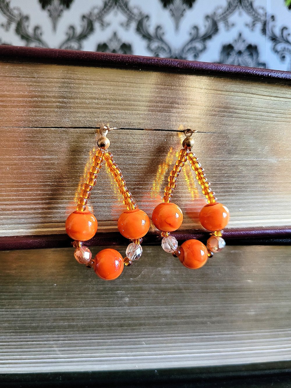 Image of Orange Marble Beaded Teardrop Hoop Earrings