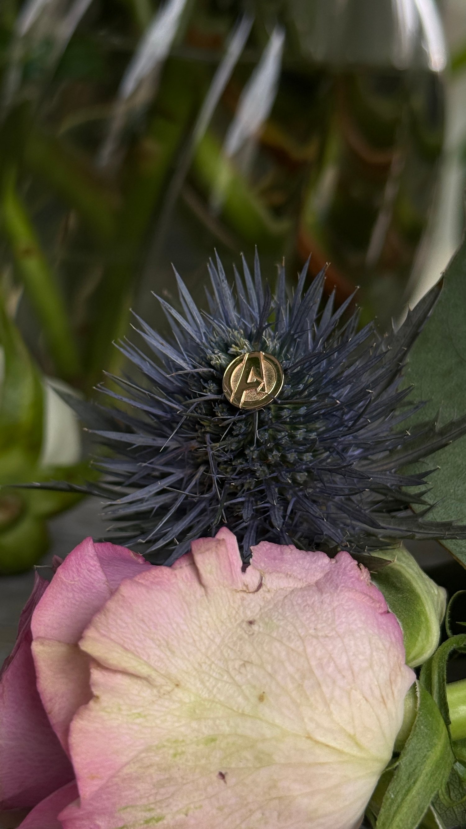 Image of 14k yellow gold avengers logo
