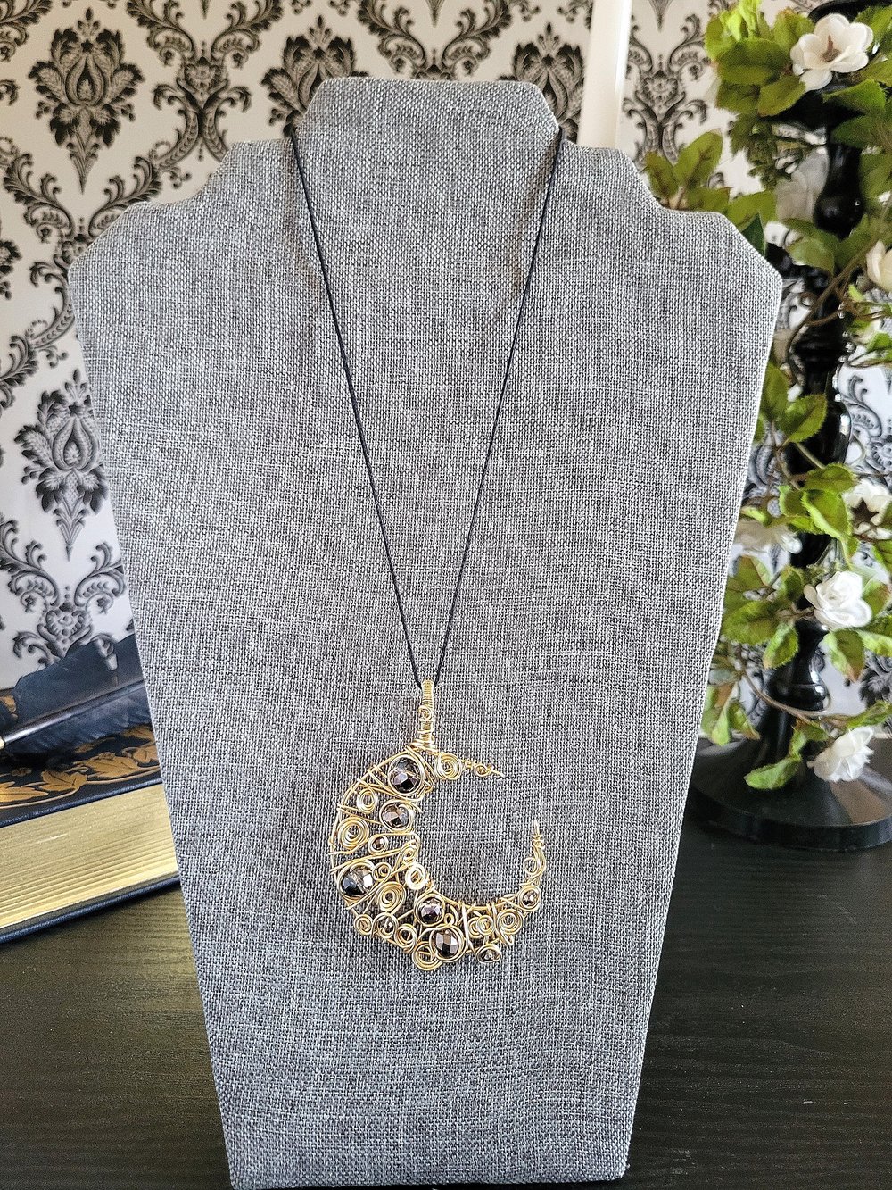 Image of Gold and Black Beaded Crescent Moon Pendant