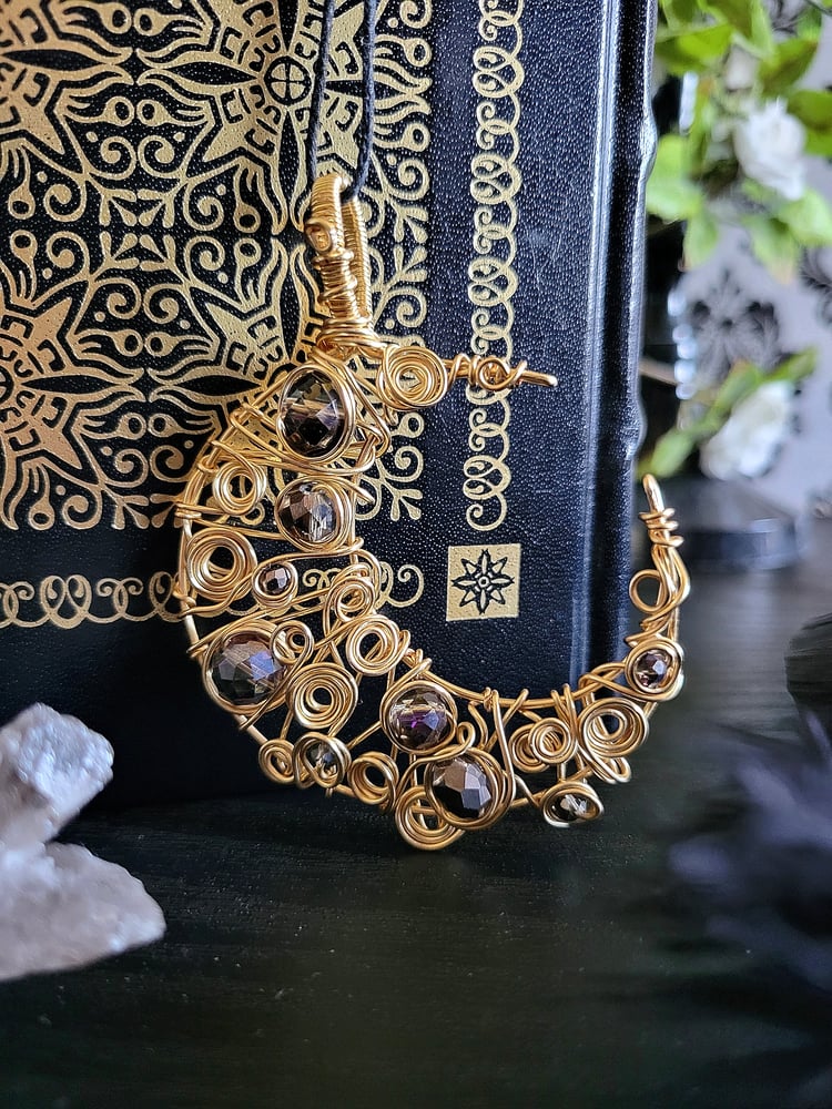 Image of Gold and Black Beaded Crescent Moon Pendant