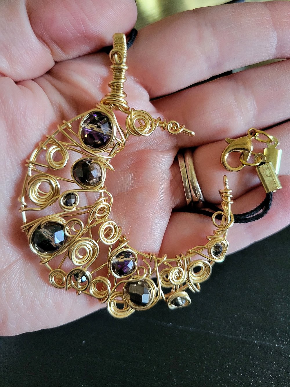 Image of Gold and Black Beaded Crescent Moon Pendant