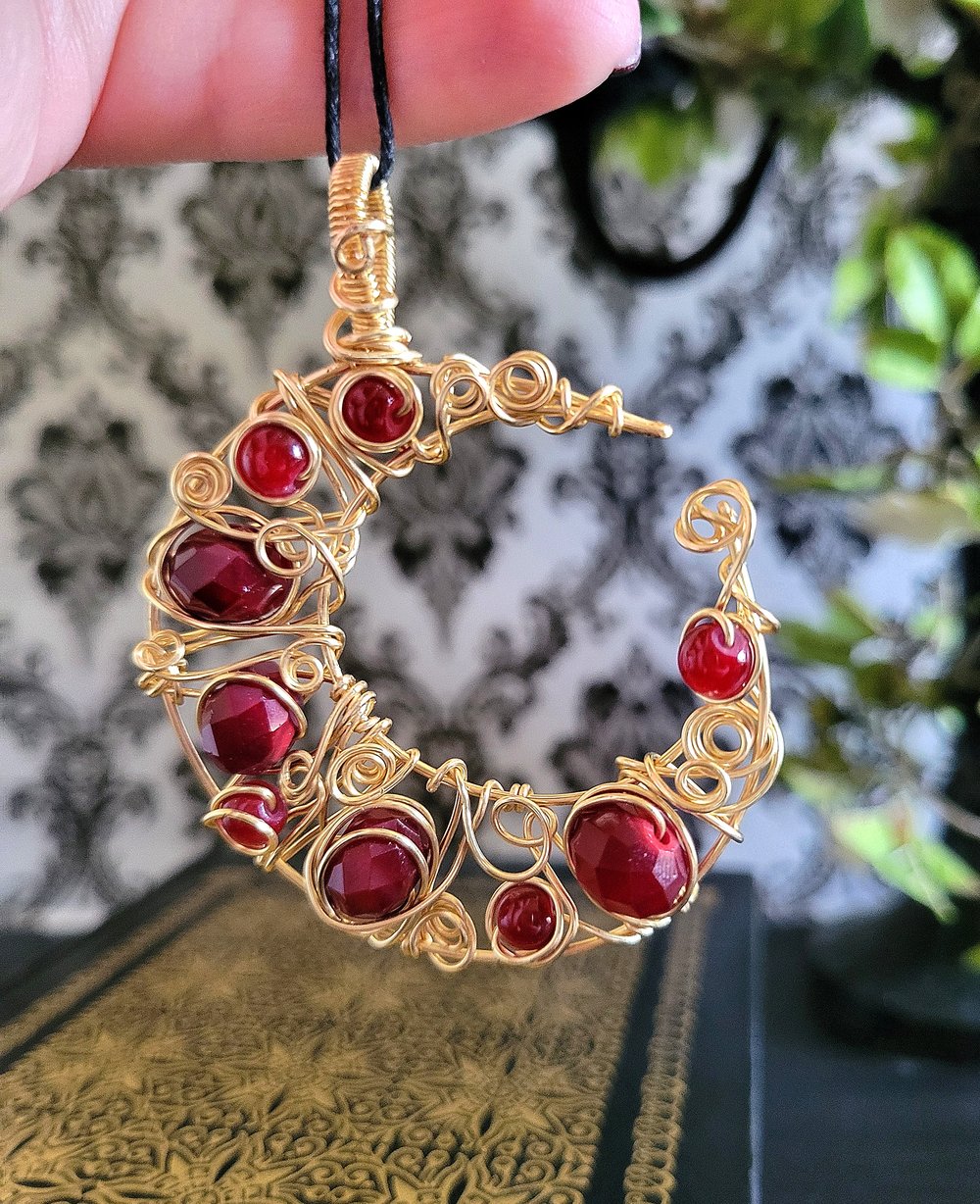 Image of Gold and Red Beaded Crescent Moon Pendant Necklace