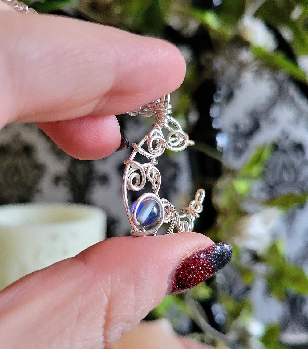 Image of Silver Crescent Moon Pendant Necklace