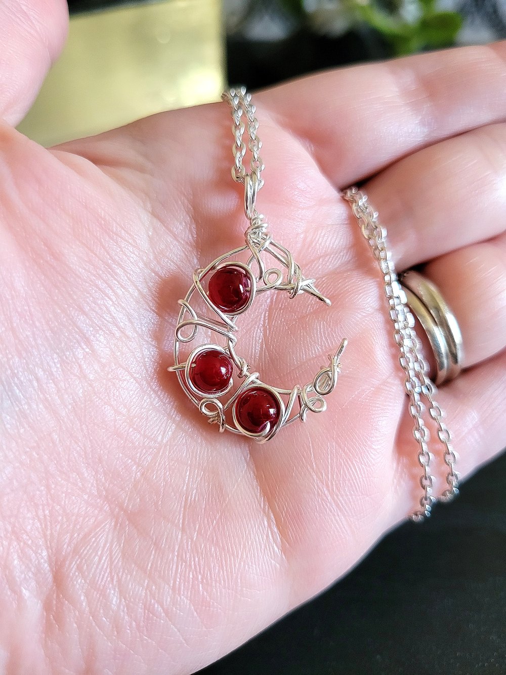 Image of Silver and Red Beaded Crescent Moon Necklace