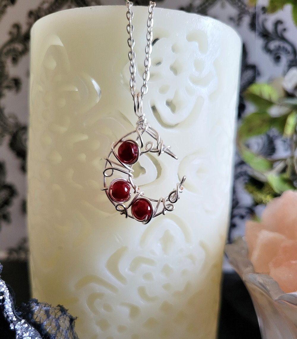Image of Silver and Red Beaded Crescent Moon Necklace