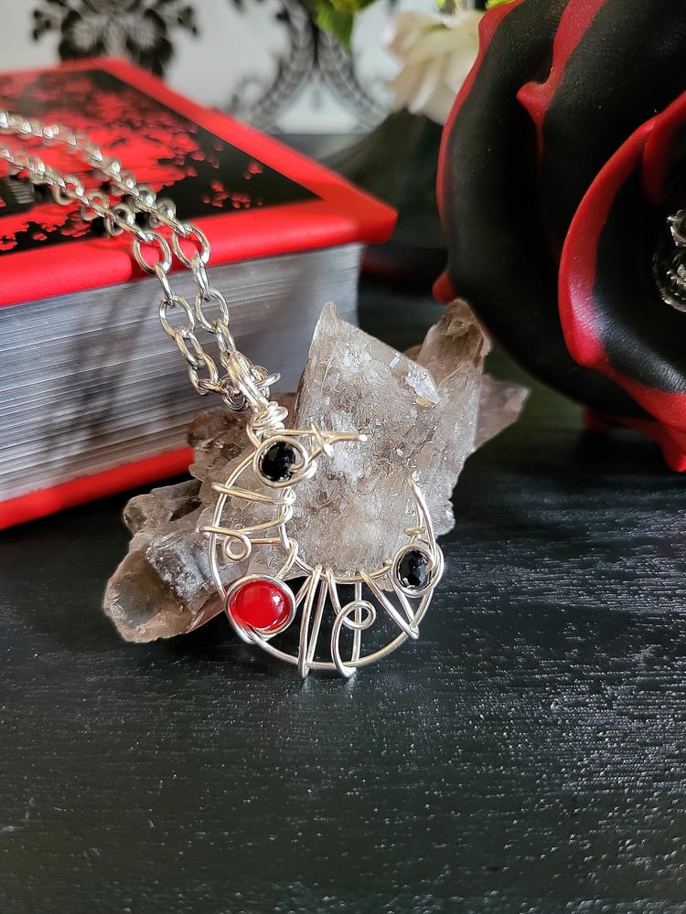 Image of Small Black and Red Beaded Crescent Moon Pendant Necklace