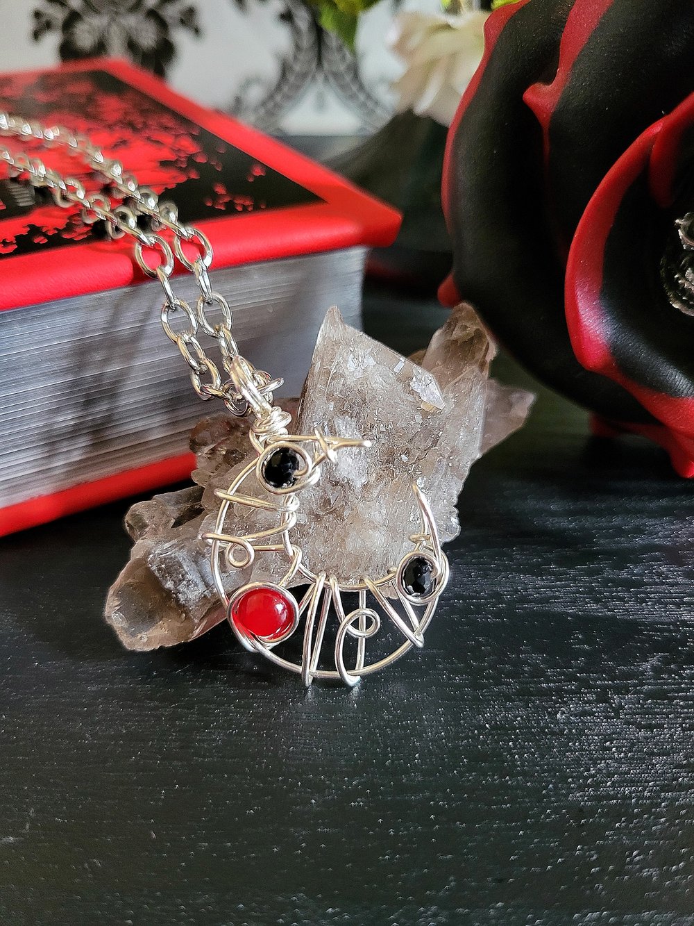 Image of Small Black and Red Beaded Crescent Moon Pendant Necklace