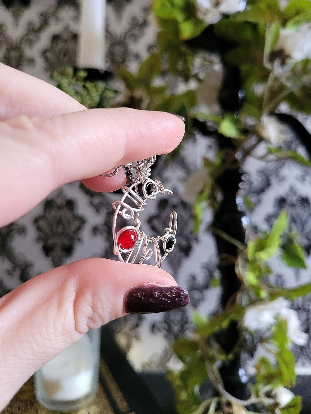 Image of Small Black and Red Beaded Crescent Moon Pendant Necklace