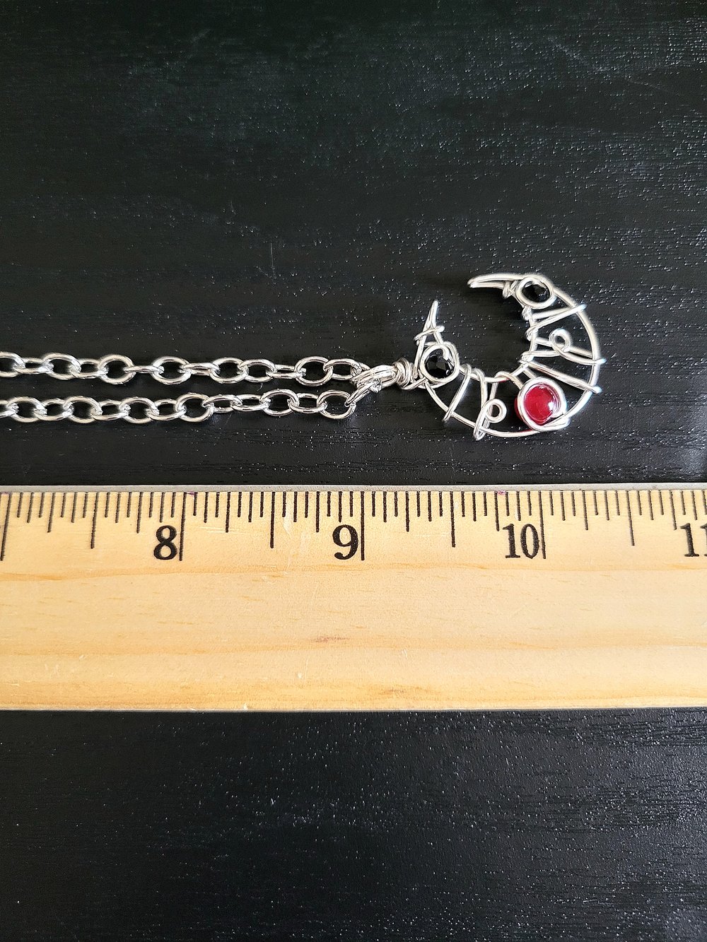 Image of Small Black and Red Beaded Crescent Moon Pendant Necklace
